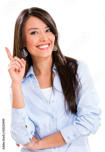 Photo: Business woman pointing an idea Business woman pointing an idea