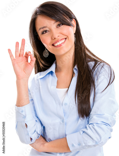 Photo: Business woman with an ok sign Business woman with an ok sign
