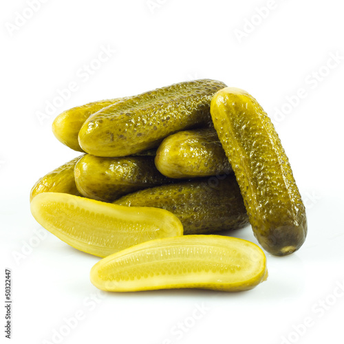 Photo: pickled cucumbers. Gherkins on a white background pickled cucumbers. Gherkins on a white background
