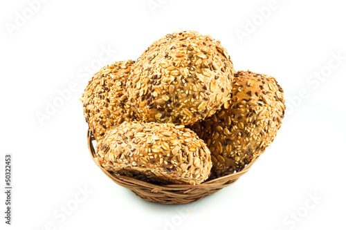 Photo: round wholemeal bread. resh buns with different seeds. round wholemeal bread. resh buns with different seeds.