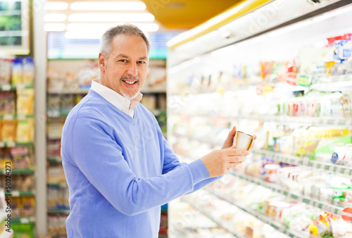 Photo: Man shopping at the supermarket Man shopping at the supermarket