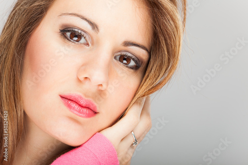Photo: Beautiful young woman portrait Beautiful young woman portrait