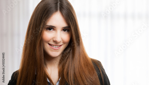 Photo: Young woman portrait Young woman portrait
