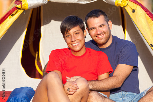 Photo: Young Couple Camping on Summer Young Couple Camping on Summer