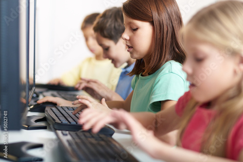 Photo: Schoolgirl at lesson Schoolgirl at lesson