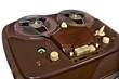 vintage analog recorder reel to reel on white background