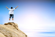 Winner man on mountain top