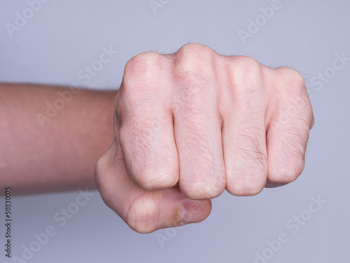 Photo: Fist of a man punching Fist of a man punching