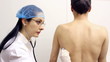 Doctor examining a patient
