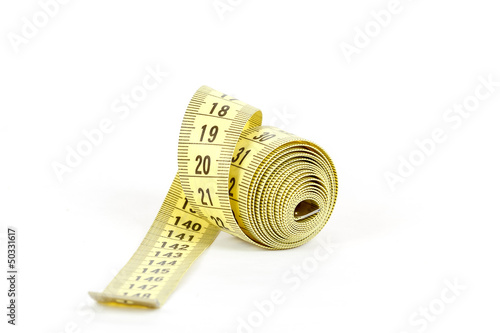 Photo: Yellow measuring tape isolated on white Yellow measuring tape isolated on white