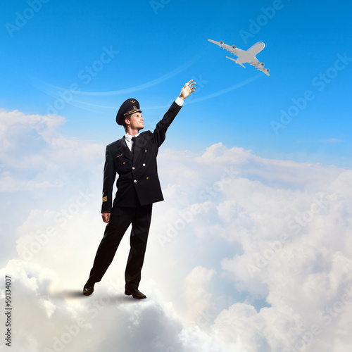Photo: Image of pilot touching air Image of pilot touching air