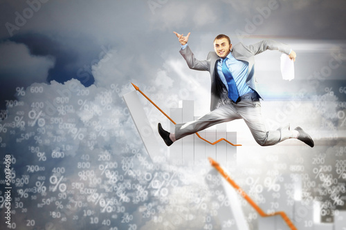 Photo: Image of jumping businessman Image of jumping businessman