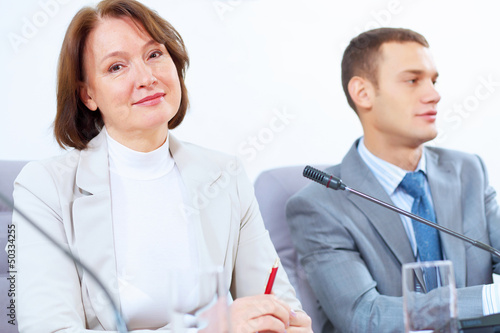 Photo: Two businesspeople at meeting Two businesspeople at meeting