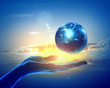 Image of earth planet on hand