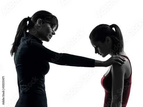 Photo: teacher woman mother teenager girl consoling discussion in silh teacher woman mother teenager girl consoling discussion in silh