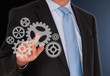 Businessman with Cogwheels