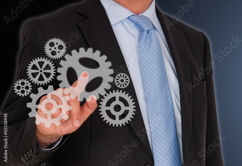 Illustration: Businessman with Cogwheels Businessman with Cogwheels