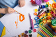 Hands of painting little boy  