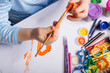 Hands of painting little boy  