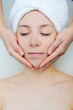 Close-up of a female receiving facial massage