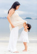 Pregnant mother and daughter