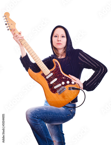 Photo: young woman with electric guitar young woman with electric guitar