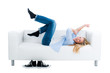 junge frau jubelt auf dem sofa
