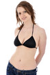 Junge Frau in Jeans und Bikinioberteil