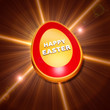 Happy Easter over shining golden egg