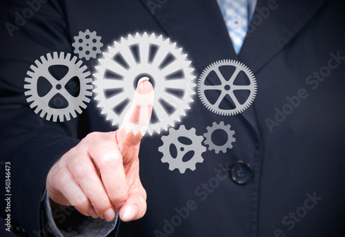 Illustration: Businesswoman with Cogwheels Businesswoman with Cogwheels