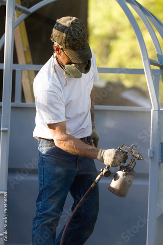 Photo: Spray Painting Worker Spray Painting Worker