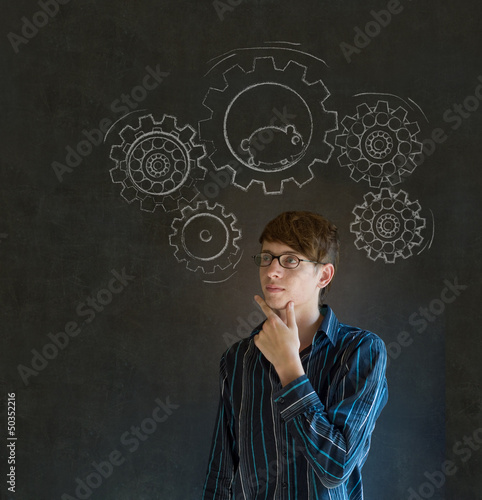 Photo: Thinking businessman with gear cogs and hamster Thinking businessman with gear cogs and hamster
