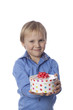 smiling boy and present