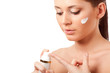 beautiful woman face with cream