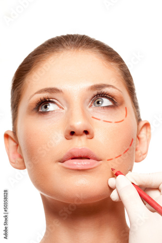 Photo: closeup woman face with surgery mark closeup woman face with surgery mark