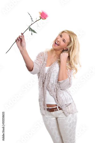 Photo: Überglückliche Blondine mit einer Rose in der Hand Überglückliche Blondine mit einer Rose in der Hand