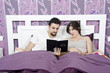 Reading a book about sex problems.