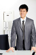 Asian business man standing