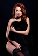 sexy redhead stylish nude young model  in fur coat