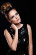 sexy stylish model in black cloth with bright makeup