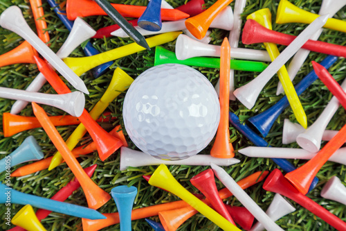 Photo: Golf ball and wooden tees collection. Golf ball and wooden tees collection.