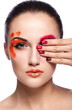 beautiful model with bright unusual creative makeup