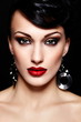 sexy model with bright makeup,with red lips and clean skin