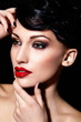 sexy model with bright makeup,with red lips and clean skin