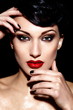 sexy model with bright makeup,with red lips and clean skin