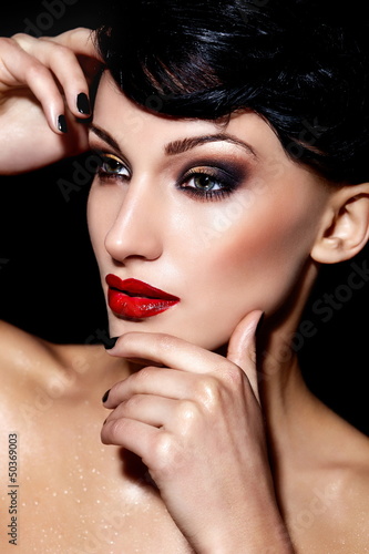 Photo: sexy model with bright makeup,with red lips and clean skin sexy model with bright makeup,with red lips and clean skin