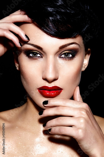 Photo: sexy model with bright makeup,with red lips and clean skin sexy model with bright makeup,with red lips and clean skin