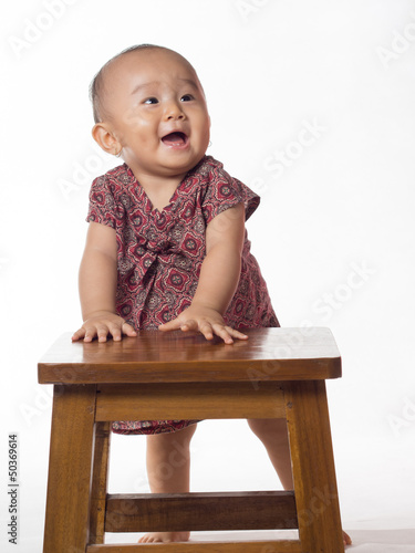 Photo: Baby Standing looking up Baby Standing looking up