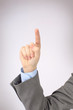 The man's hand shows a symbol