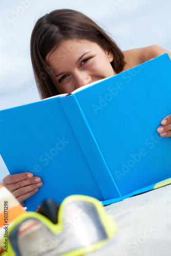 Photo: Sunbather with book Sunbather with book